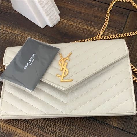 ysl clutch white|yves saint laurent clutch.